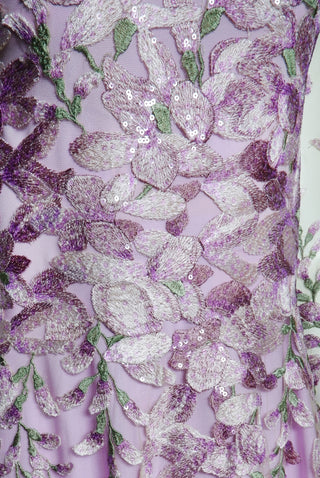 FLORAL FIT AND FLARE GOWN WITH CASCADING SLEEVES